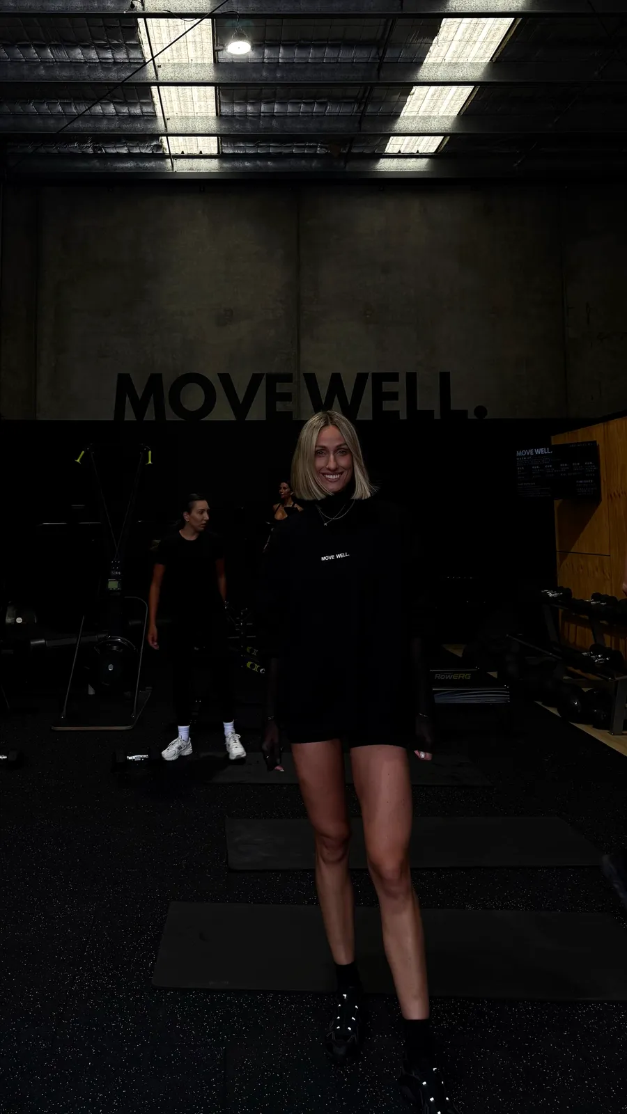 Kim coaching inside Move Well Studio